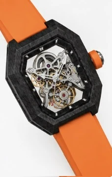 Project 2 with the orange strap, three-quarter view of the carbon-fibre case and crown