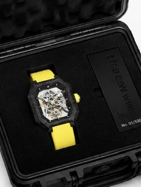 Project 2 with the yellow strap in its black presentation case, beside the numbered the new wave plate