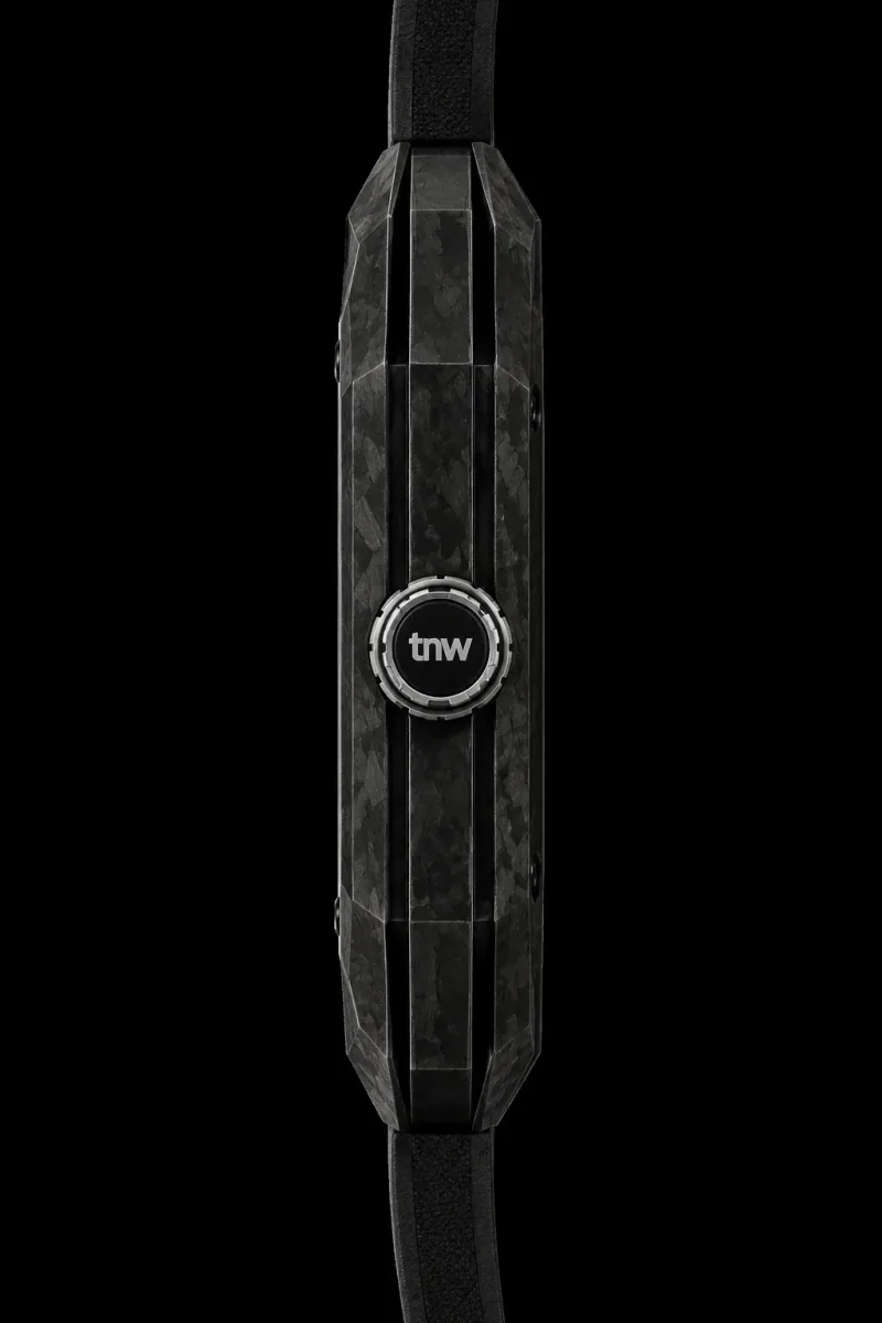 Project 2 side profile: the faceted carbon-fibre case with the TNW-marked crown